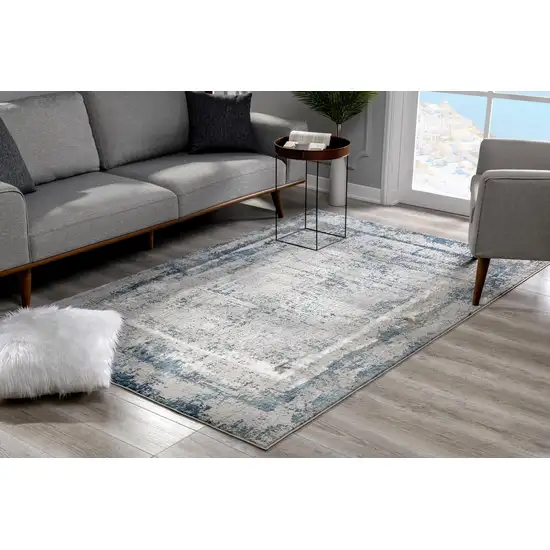 Ivory and Blue Abstract Distressed Area Rug Photo 10