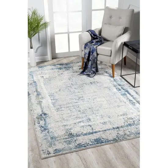 Ivory and Blue Abstract Distressed Area Rug Photo 9