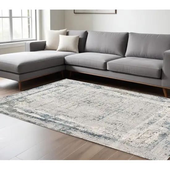 Blue and Ivory Abstract Area Rug Photo 1