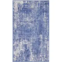 Photo of Ivory and Blue Abstract Distressed Area Rug