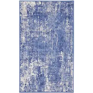 Photo of Ivory and Blue Abstract Distressed Area Rug