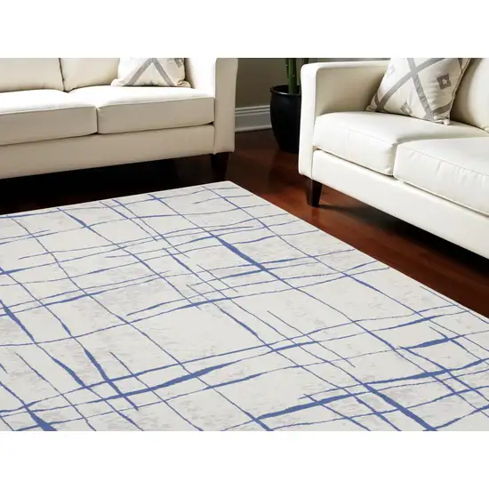 Ivory and Blue Abstract Distressed Non Skid Area Rug Photo 1