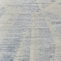 Photo of Ivory and Blue Abstract Hand Knotted Worn Faded Area Rug