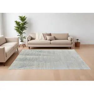 Photo of Ivory and Blue Abstract Hand Knotted Worn Faded Area Rug