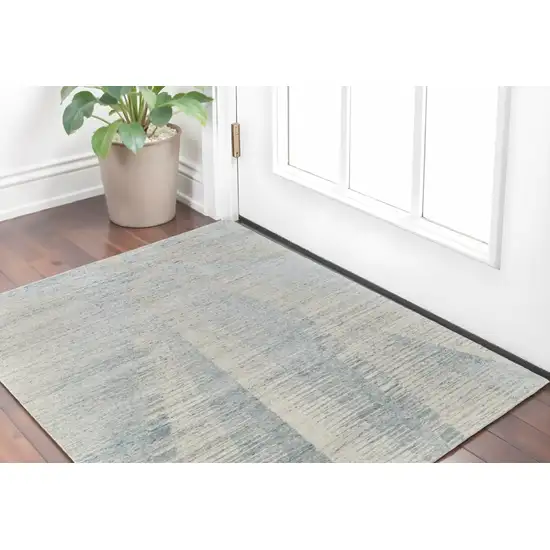 Ivory and Blue Abstract Hand Knotted Worn Faded Area Rug Photo 1