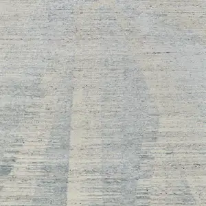 Photo of Ivory and Blue Abstract Hand Knotted Worn Faded Area Rug