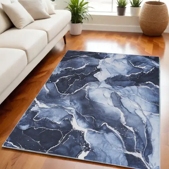 Ivory and Blue Abstract Power Loom Area Rug Photo 1