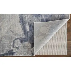 Photo of Ivory and Blue Abstract Power Loom Worn Faded Area Rug