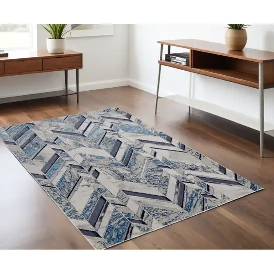 Ivory and Blue Chevron Power Loom Distressed Area Rug Photo 1