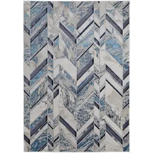 Photo of Ivory and Blue Chevron Power Loom Distressed Area Rug