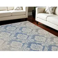 Photo of Ivory and Blue Damask Distressed Non Skid Area Rug