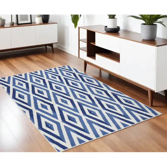 Blue And Ivory Geometric Dhurrie Area Rug Photo 1