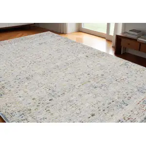 Photo of Ivory and Blue Floral Area Rug