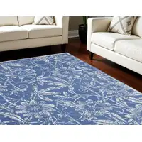 Photo of Ivory and Blue Floral Distressed Non Skid Area Rug