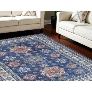 Photo of Ivory and Blue Floral Medallion Distressed Non Skid Area Rug