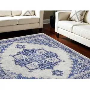 Photo of Ivory and Blue Floral Medallion Distressed Non Skid Area Rug