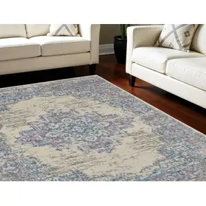 Photo of Ivory and Blue Floral Medallion Distressed Non Skid Area Rug