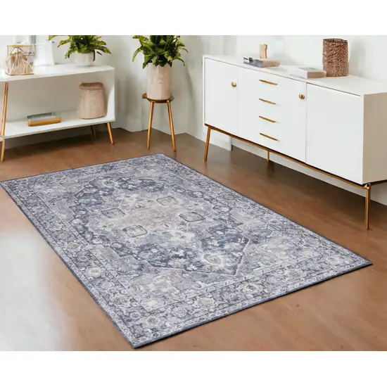 Ivory and Blue Floral Power Loom Distressed Area Rug Photo 1