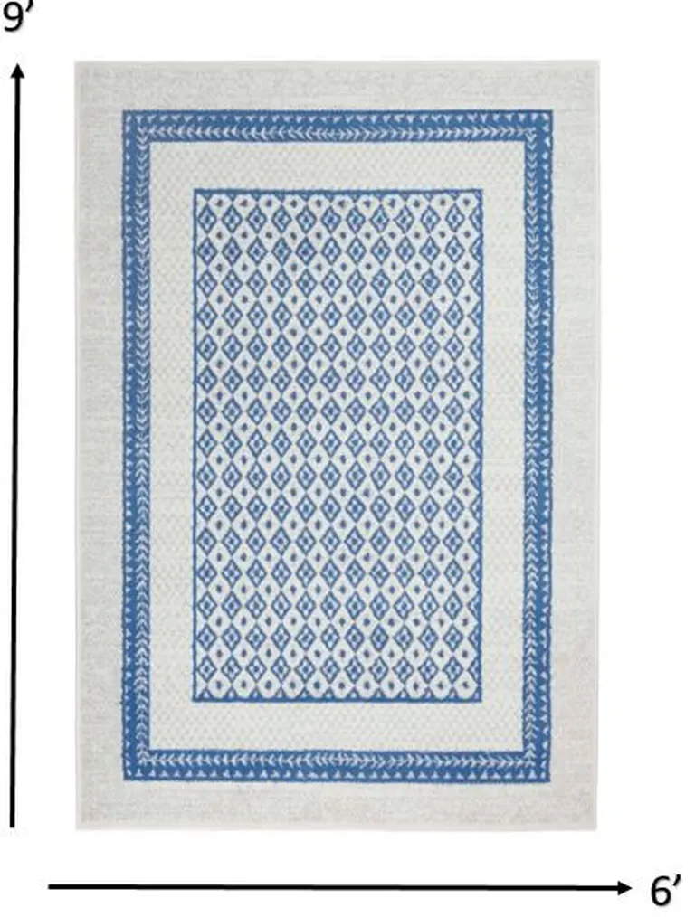 Ivory and Blue Geometric Area Rug Photo 1