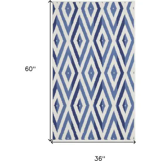 Ivory and Blue Geometric Area Rug Photo 3