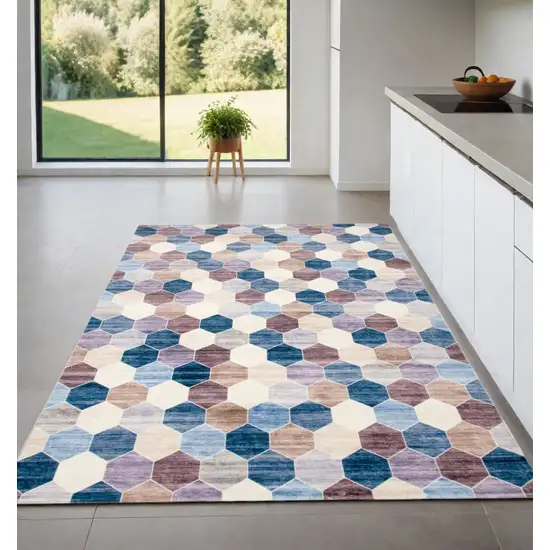 Ivory and Blue Geometric Distressed Area Rug Photo 1