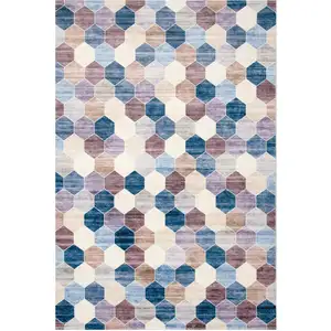 Photo of Ivory and Blue Geometric Distressed Area Rug