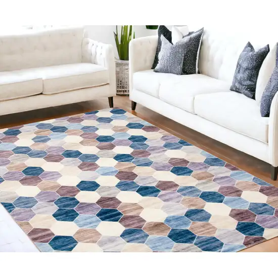 Ivory and Blue Geometric Distressed Area Rug Photo 1