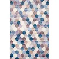 Photo of Ivory and Blue Geometric Distressed Area Rug