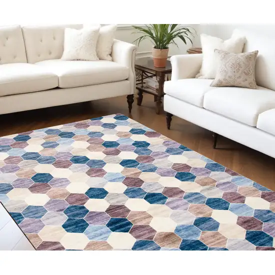 Ivory and Blue Geometric Distressed Area Rug Photo 1