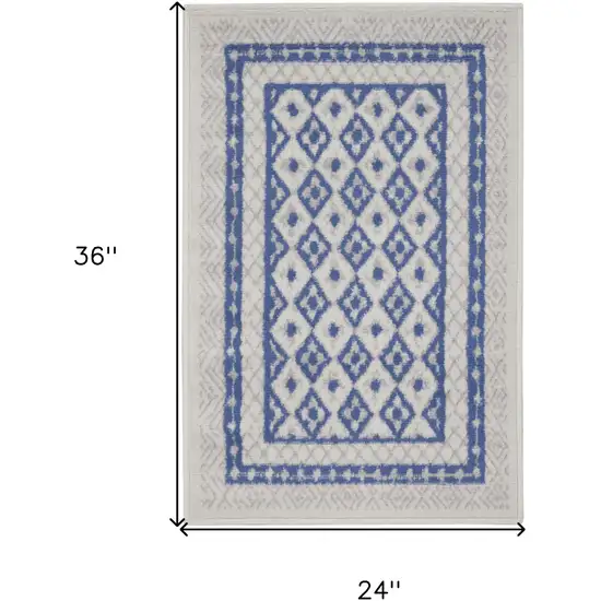 Ivory and Blue Geometric Distressed Area Rug Photo 3