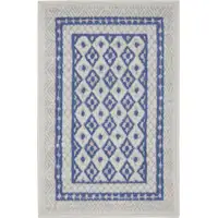 Photo of Ivory and Blue Geometric Distressed Area Rug