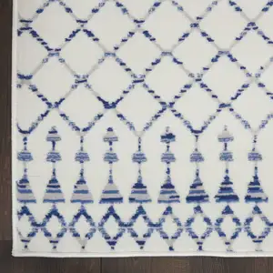 Photo of Ivory and Blue Geometric Distressed Non Skid Area Rug