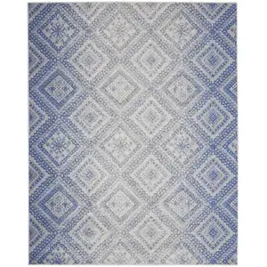 Photo of Ivory and Blue Geometric Distressed Non Skid Area Rug