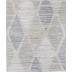 Photo of Ivory and Blue Geometric Hand Woven Area Rug