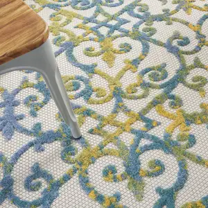 Photo of Ivory and Blue Indoor Outdoor Area Rug