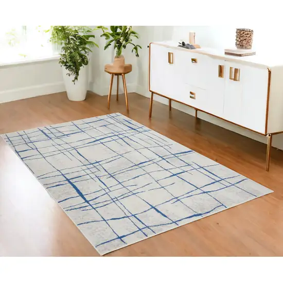 Blue And Ivory Abstract Dhurrie Area Rug Photo 1