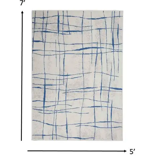 Ivory and Blue Irregular Grids Area Rug Photo 1