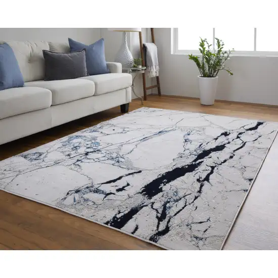 Ivory and Blue Marble Power Loom Distressed Area Rug Photo 6