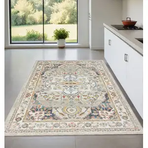 Photo of Ivory and Blue Oriental Power Loom Area Rug