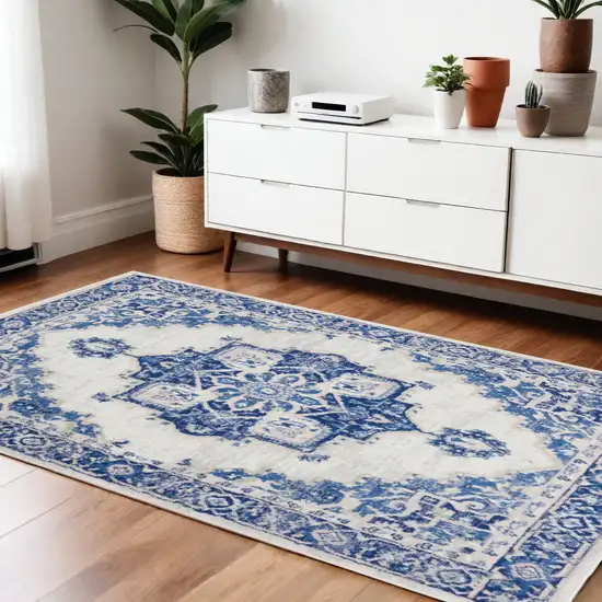 Blue And Ivory Floral Dhurrie Area Rug Photo 1