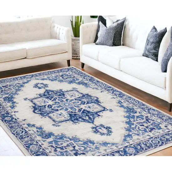 Blue And Ivory Floral Dhurrie Area Rug Photo 1