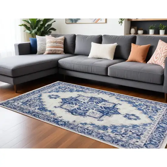 Blue And Ivory Floral Dhurrie Area Rug Photo 1