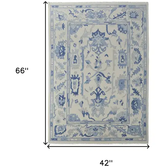 Ivory and Blue Wool Floral Hand Knotted Area Rug With Fringe Photo 6