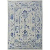 Photo of Ivory and Blue Wool Floral Hand Knotted Area Rug With Fringe