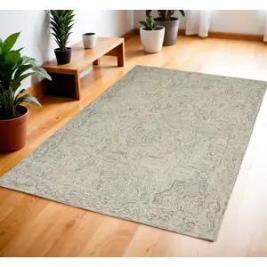 Photo of Ivory and Blue Wool Geometric Area Rug