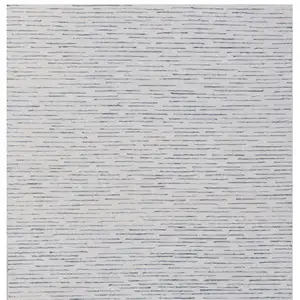 Photo of Ivory and Blue Wool Striped Hand Tufted Area Rug