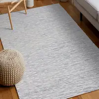 Photo of Ivory and Blue Wool Striped Hand Tufted Area Rug