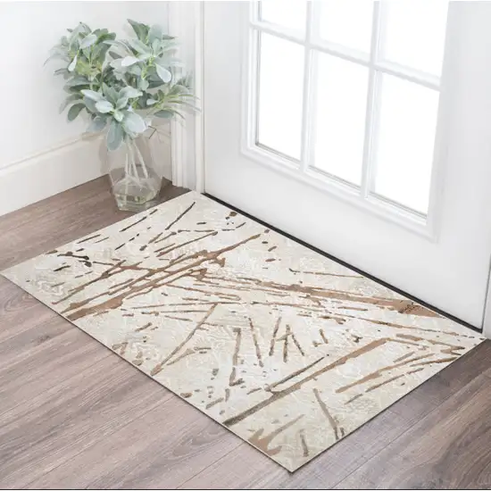 Ivory and Brown Abstract Area Rug Photo 3