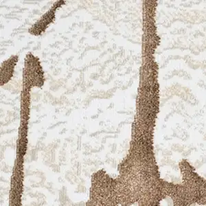 Photo of Ivory and Brown Abstract Area Rug