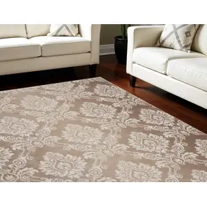 Photo of Ivory and Brown Damask Distressed Non Skid Area Rug